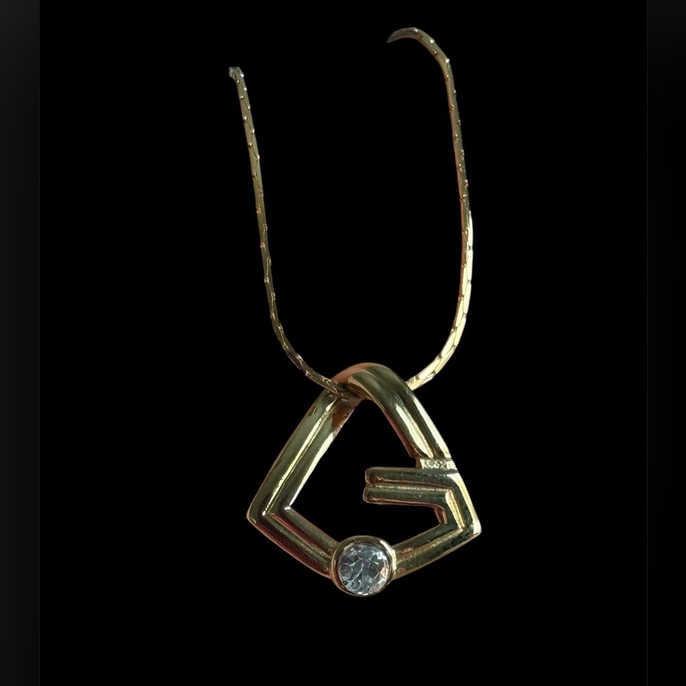 Givenchy gold-tone geometric pendant with a rhinestone necklace